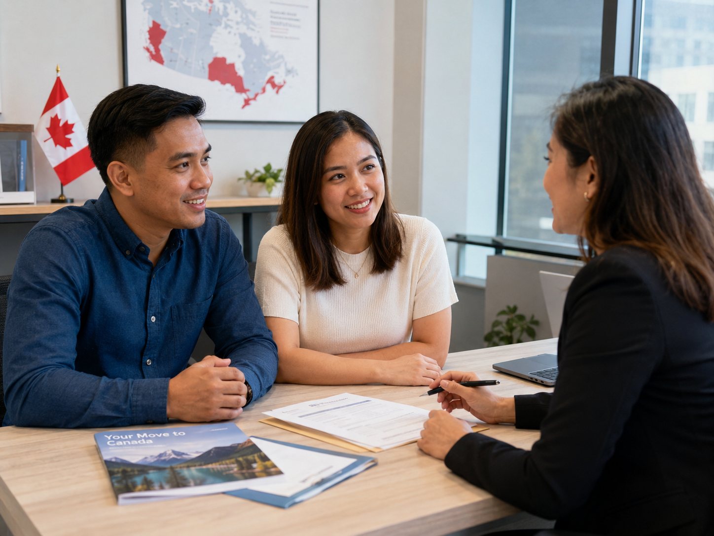 Couple meeting an immigration consultant about spousal sponsorship in Canada